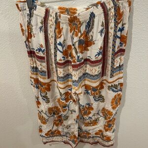 Patrons of Peace White and Orange Bermudas Vibrant Floral Geometric Design
